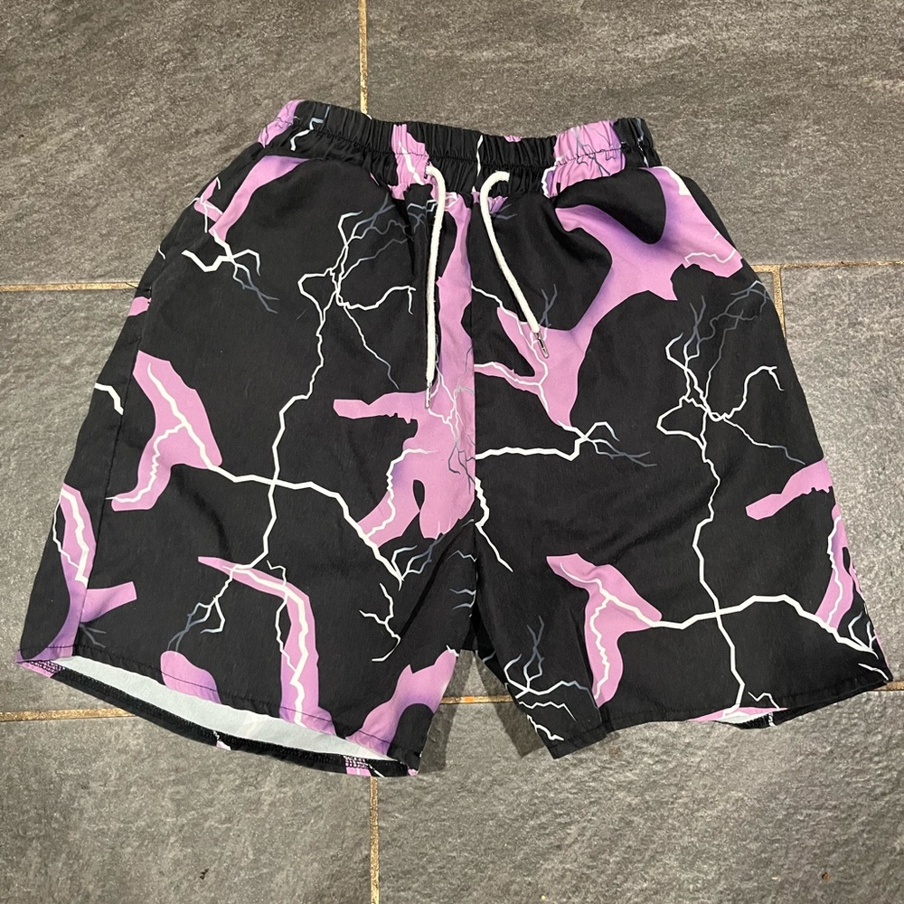 Black and purple lightning shorts